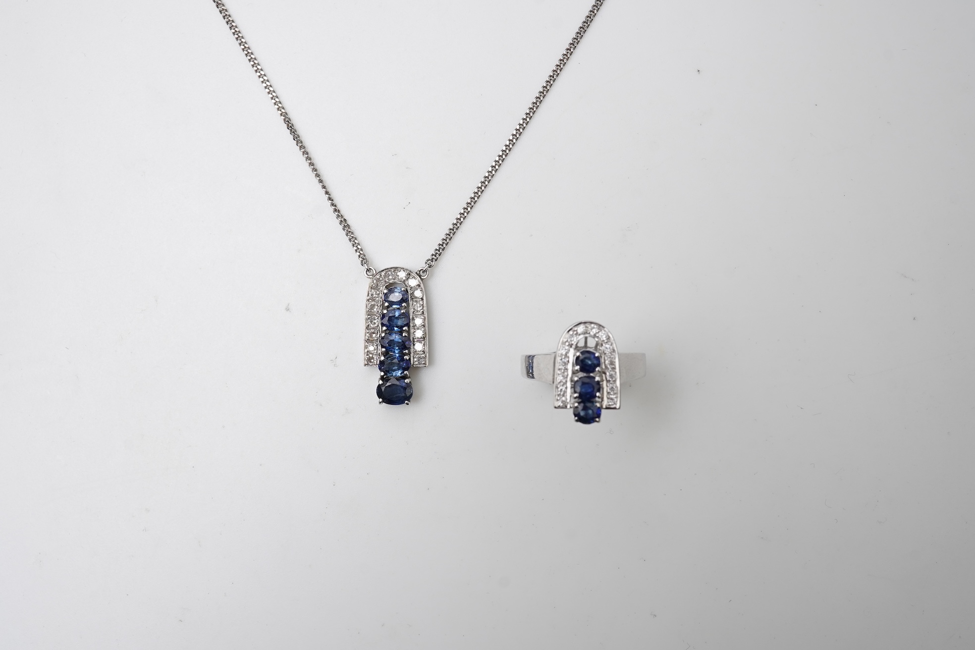 A sapphire and diamond demi-parure